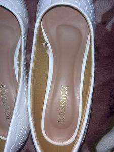 Iconic White Ballerinas