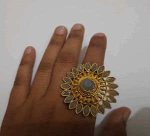 Gold tone floral adjustable ring