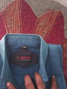 Photo not clear but shirt like a new. New jesi