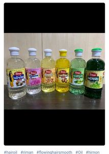 Riman hair oil 500gm Thick and shiny hirNon sticky &free Flowing hairSmooth & Bouncy HairThe  Classic Fragrance