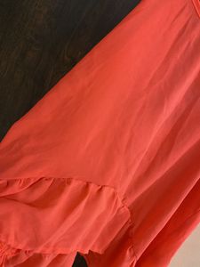 Coral Tank Top with Ruffle Detail