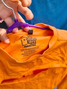 Orange Cutout Long Sleeve Top