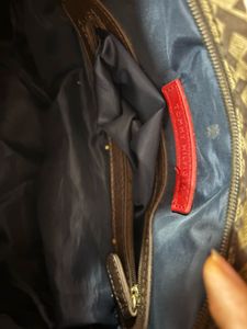 Tommy Hilfiger monogram handbag in brown and tan