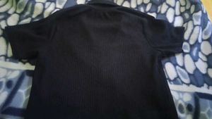 Black Zip-Up Ribbed Polo Top