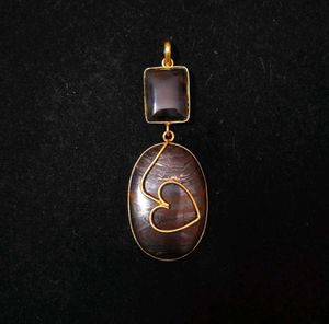 Unique Stone Gold Tone Pendant