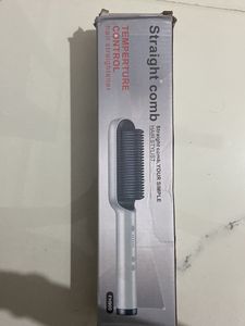 Straightening comb with temp control