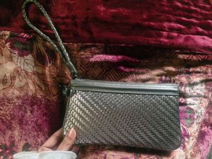 Woven Metallic Silver Clutch