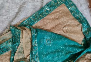 CREAM AND TURQUOISE GREEN SAREE