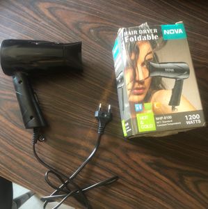 Nova hair dryer , with one year warranty , new pack piece and never used