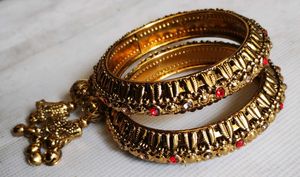 Elegant Bangles with Bell Charms