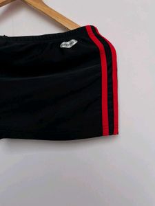 Adidas black three striped red mini shorts