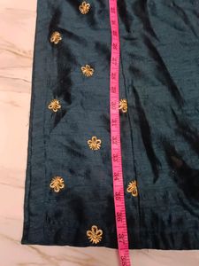 Its a Blue Dress.. With Beads Work On It.
