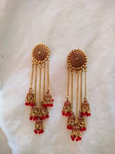 Golden Jhumka Earrings with Red Beads 💎