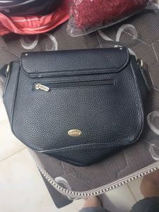 black sling bag