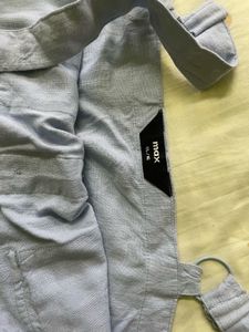 Blue Romper with Button Detail