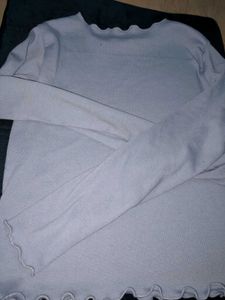 Soft Grey KnitwearFrill-edge, cozy and– perfec