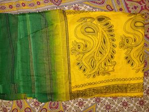 Yellow Cotton Saree With Green Border.