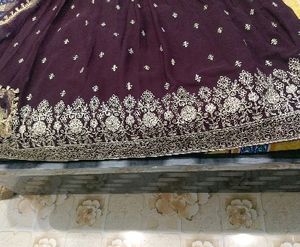 Elegant Purple Embroidered ethnic gowns