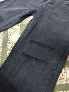 Ripped Black Wash Wide Leg Jeans And White Top