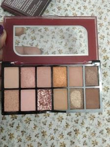 Swiss Beauty Concealer and Mars eyeshadow palette
