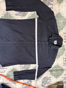 Combo of Black shirt and blue jeans