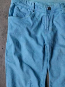 Distressed Light Blue Jeans