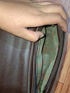 brown sling bag