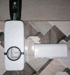 Tootpaste Dispenser And Tootbrush Holder