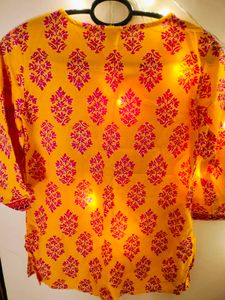 A Yellow Floral Print Tunic For Women