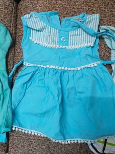 Baby Frocks And Rocker Chair