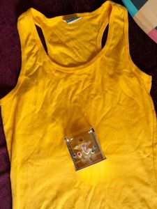Racerback Yellow Top And Ganesha Idol For Car