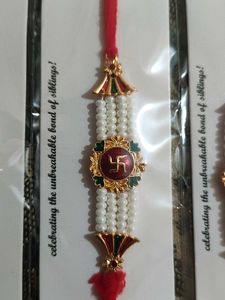 Swastik Rakhi With White Pearls💗