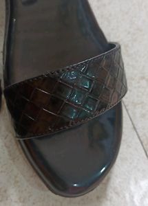 Black slippers
