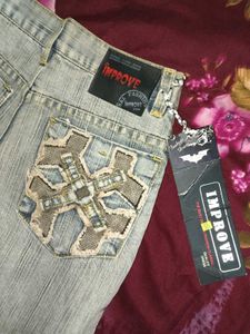 PATCHWORK BELL BOTTOM JEANS