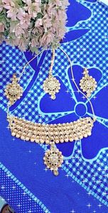 golden choker set with teeka