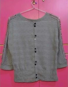Gray Knit Top with side cut designs in both hands