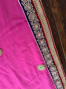 Rani Pink Saree With Embellished Border And Blouse