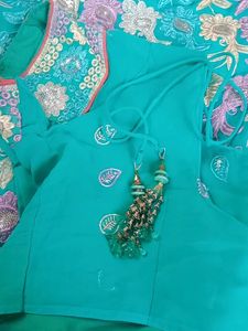 Elegant Teal Embroidered Saree