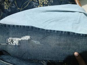 Distressed Jeans with Light Blue Flare