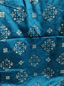 Elegant Teal Saree with Gold Accents