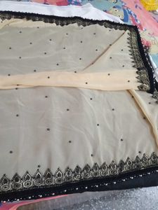 A Black Border With Moti World New Sari