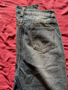 Flared Ripped Blue Jeans
