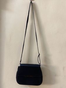Black Colour Leather Sling And Also Shoulder Bag