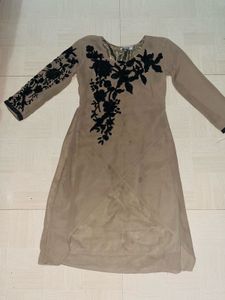 Elegant Beige Tunic with Black Embroidery