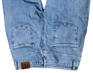 Ripped Blue Denim Jeans