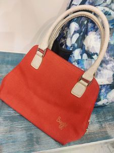 Baggit Red and beige hand bag