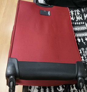 VIP Maroon Soft Textured With Wheels Trolly Bag