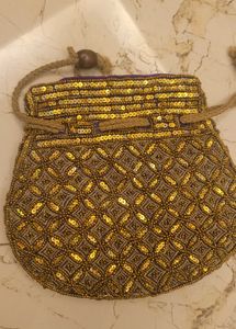 Exotic India Embroidered Satin Potli