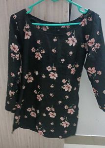 Black Short Kurti With Printed Flower On It