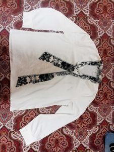 White Top with Black Tie
